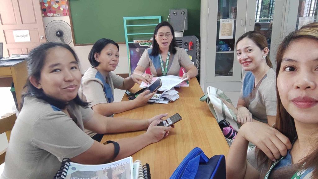 BINHI Teacher-Implementers Collaborate in Feedback Meeting with Mrs. Tagarao